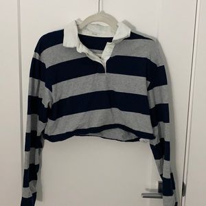 Dark blue and grey striped polo shirt